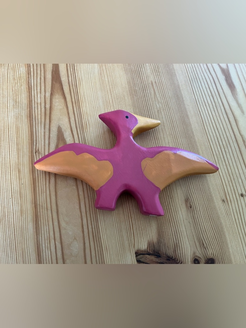 Colorful wooden Dino
